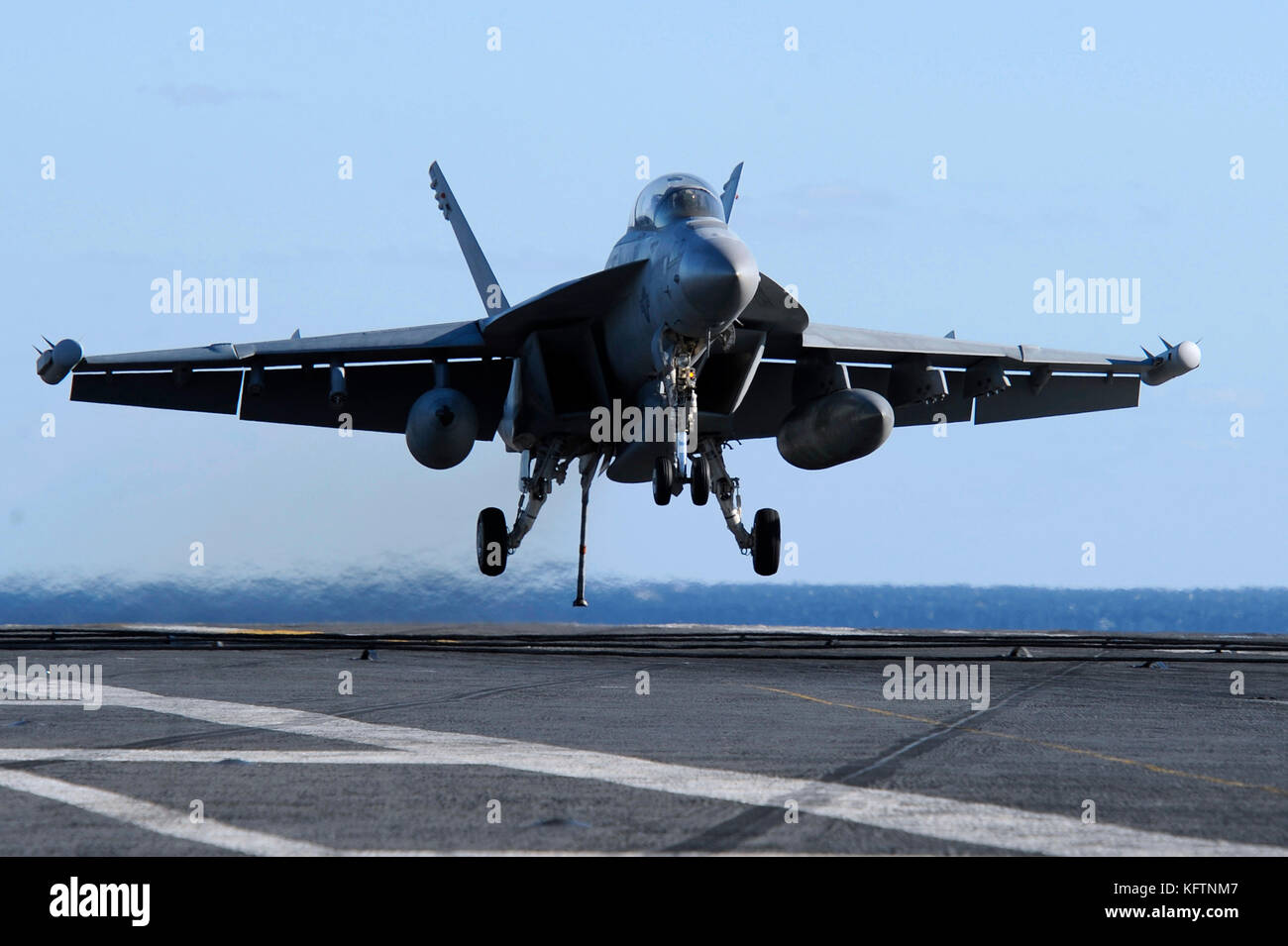 EA-18G Growler assigned to the 'Rooks' of Electronic Attack Squadron (VAQ) 137 prepares to land Stock Photo