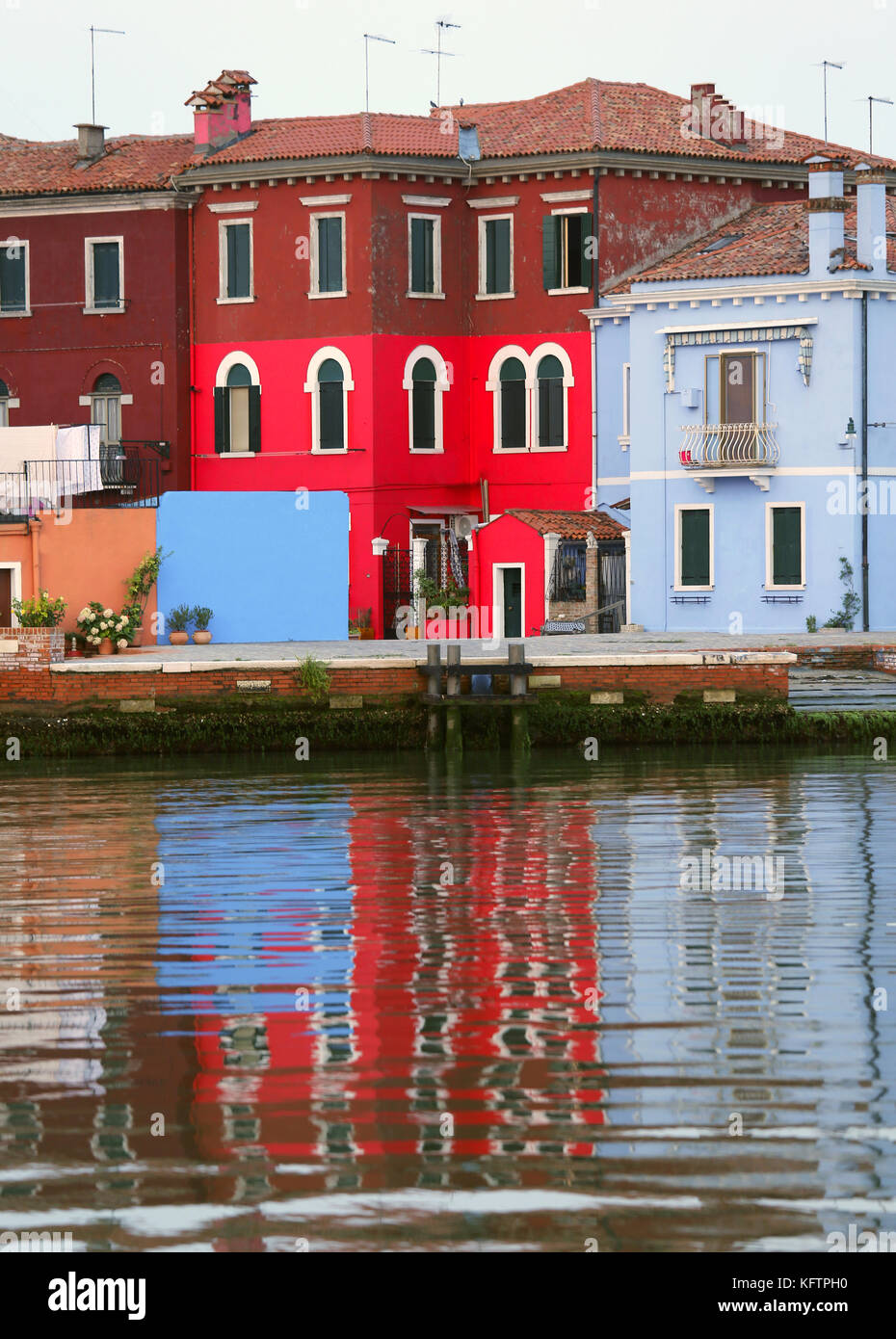 colored house and one red house in BURANO island near Venice in Northen Italy Stock Photo