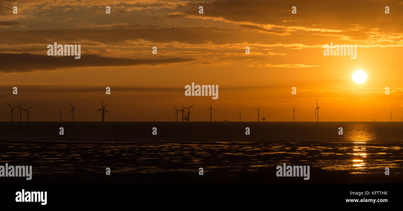 Wind turbines off shore from Formby Coast. North West England Stock Photo