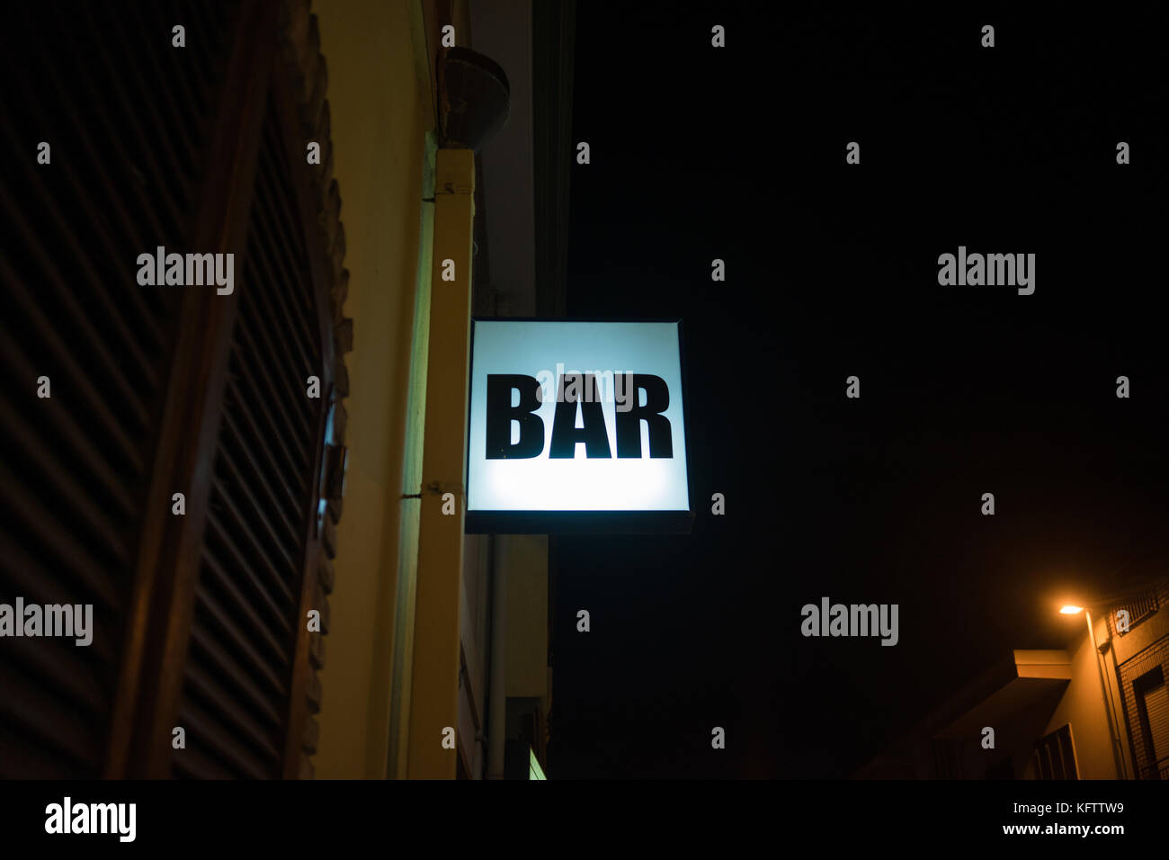Bar Neon sign illuminated at night Stock Photo - Alamy