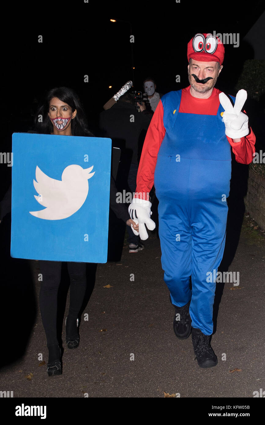 Konnie Huq and Charlie Brooker arrive at a Halloween party hosted by