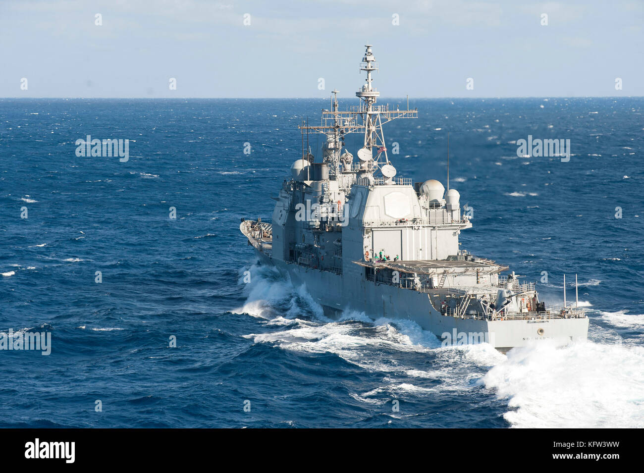The Ticonderoga-class guided-missile cruiser USS Normandy (CG 60) transits the Atlantic Ocean Stock Photo