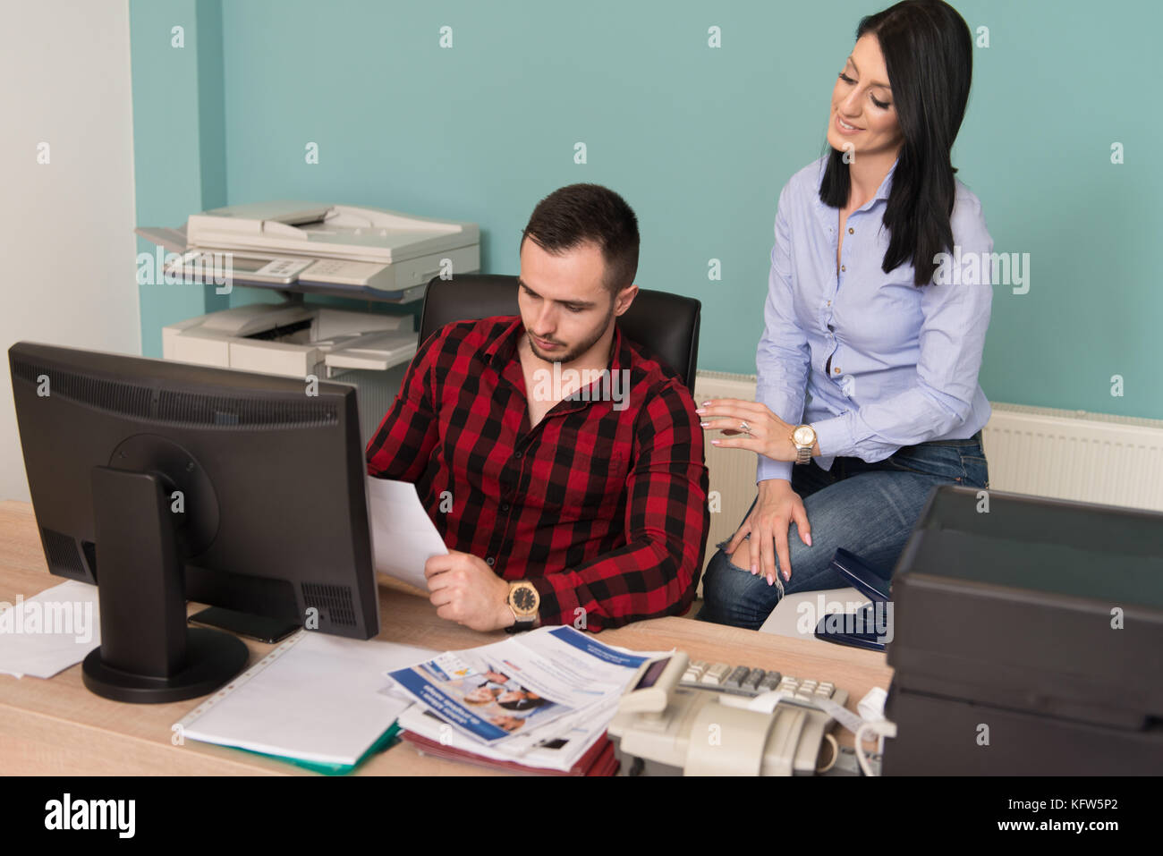 Happy Young Business Man And Woman Work In Modern Office On Computer ...