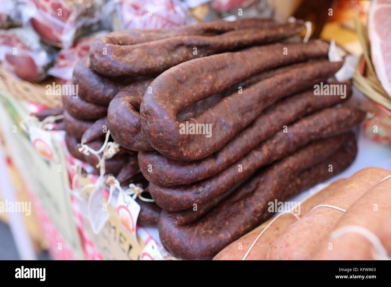 Famous Norcia  liver salami for sale on street stall at the chestnut festival. Stock Photo