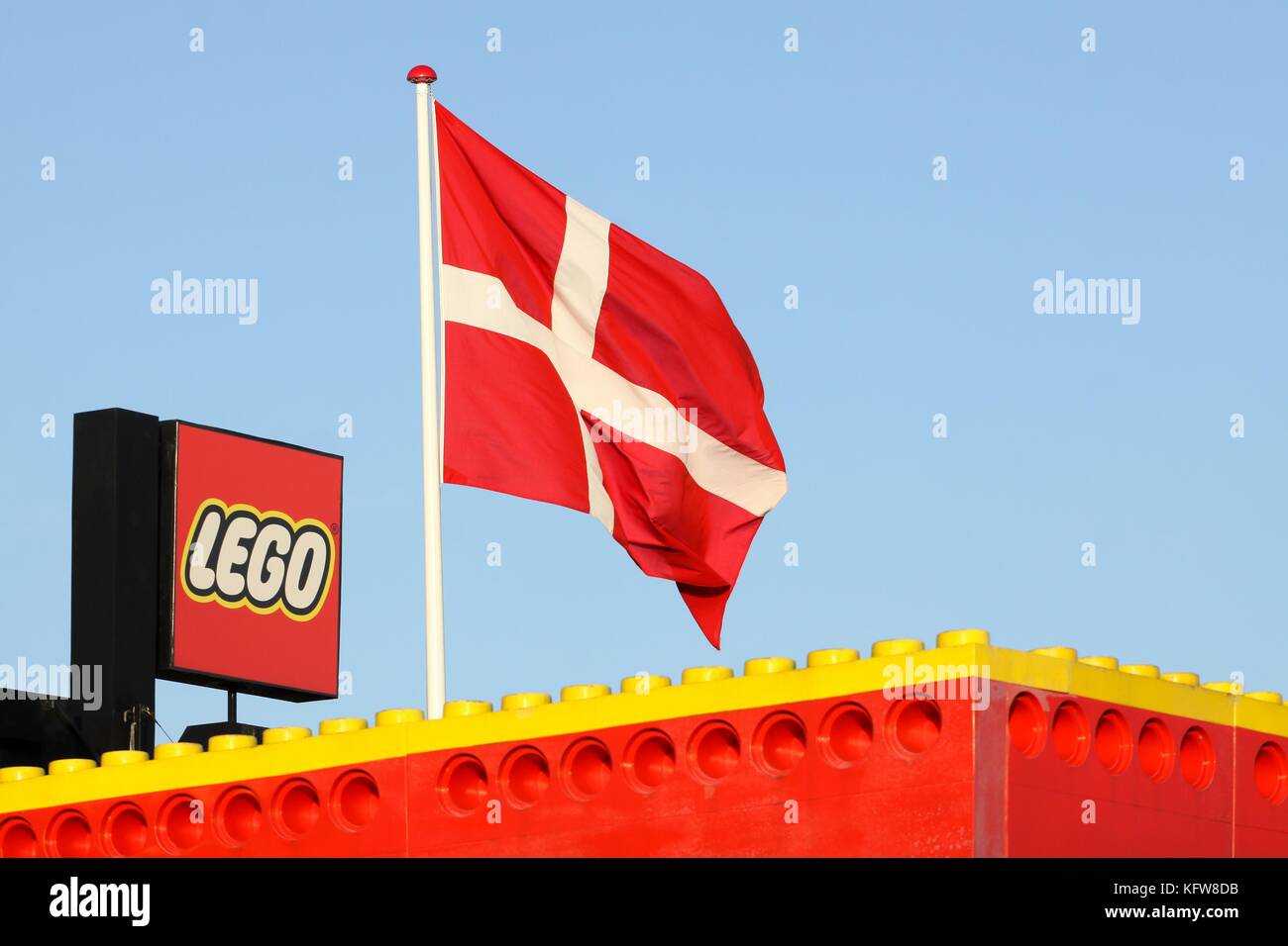 Billund, Denmark - November 12, 2015: Lego logo on a building. Lego is a line of plastic construction toys that are manufactured by the group Lego Stock Photo