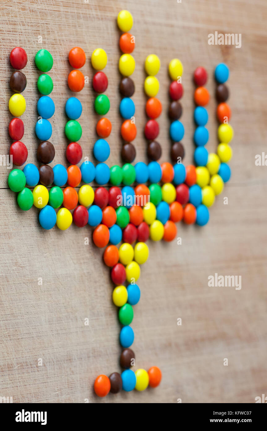 Hanukkah menorah made out of colorful candy Stock Photo Alamy