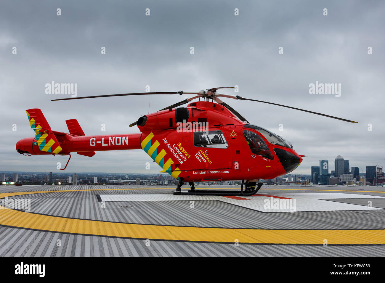 London Air Ambulance lands on the helipad of the Royal London Hospital Stock Photo