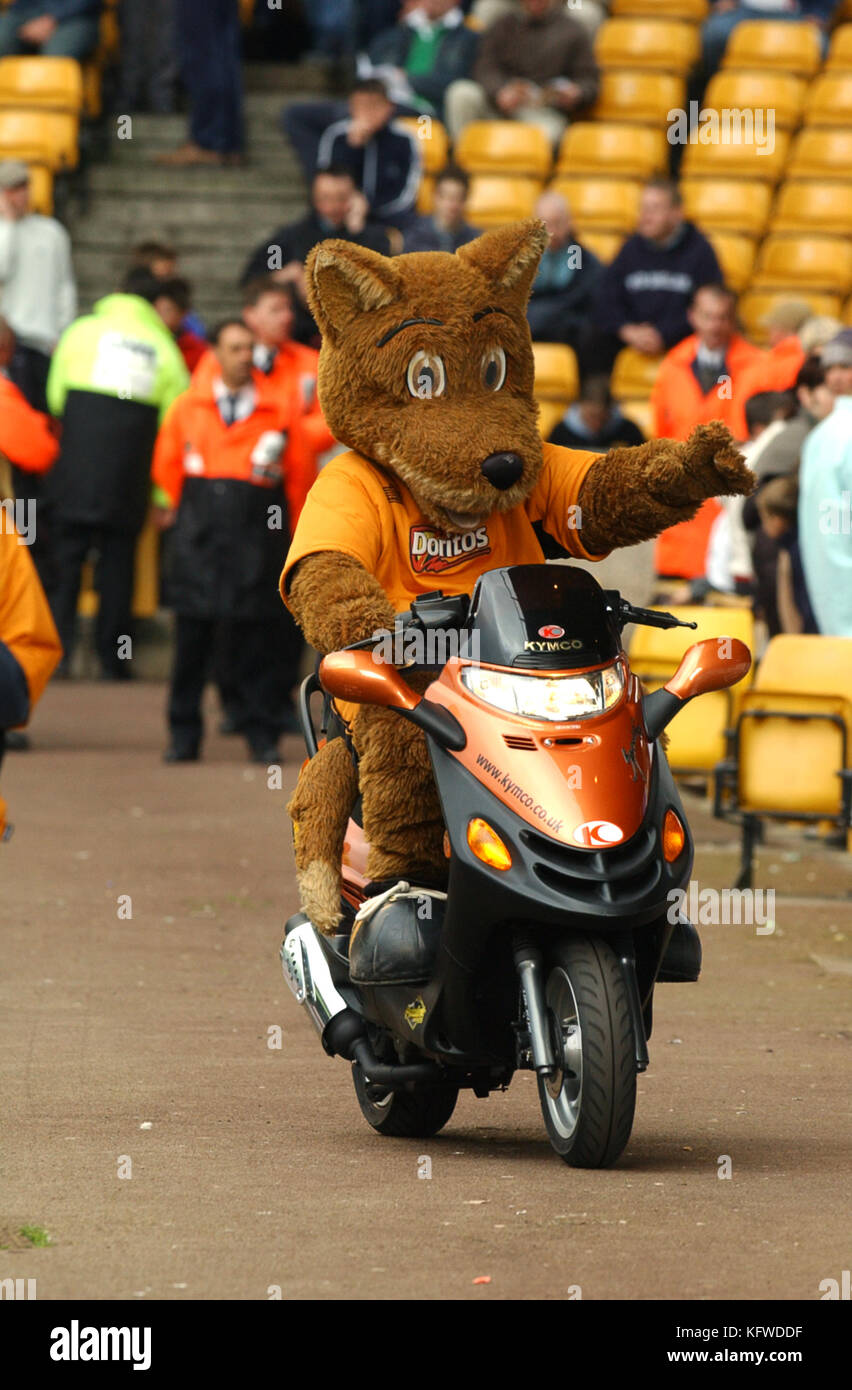 Wolverhampton Wanderers mascot Wolfie riding motor scooter 19 April 2003 Stock Photo
