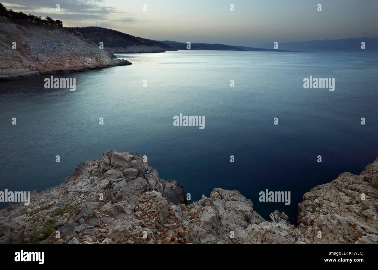 Rocky shore with sunset hi-res stock photography and images - Alamy