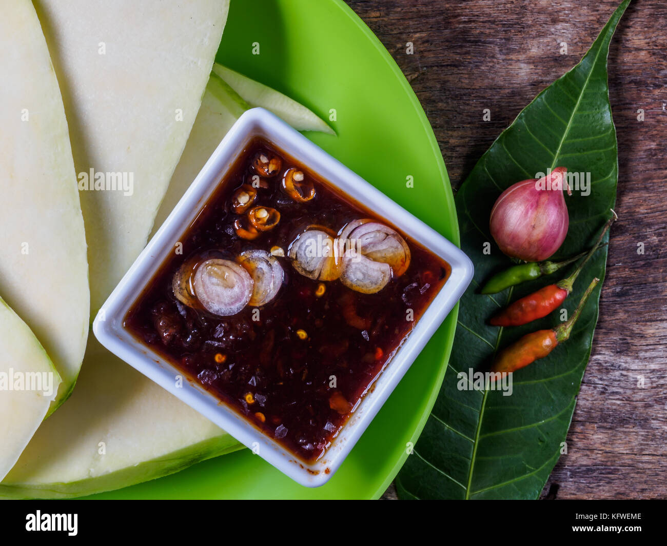 Green Mango with Sweet fish sauce(Thai dip Sauce), Popular Thai food
