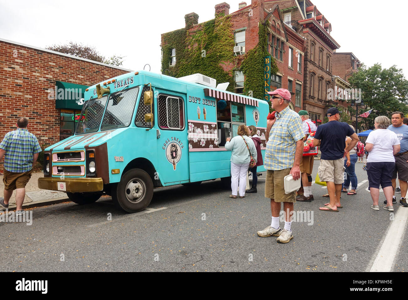 Soft serve Ice cream van, truck in the streets with line of people to order, Easton, Pennsylvania, United states. Stock Photo