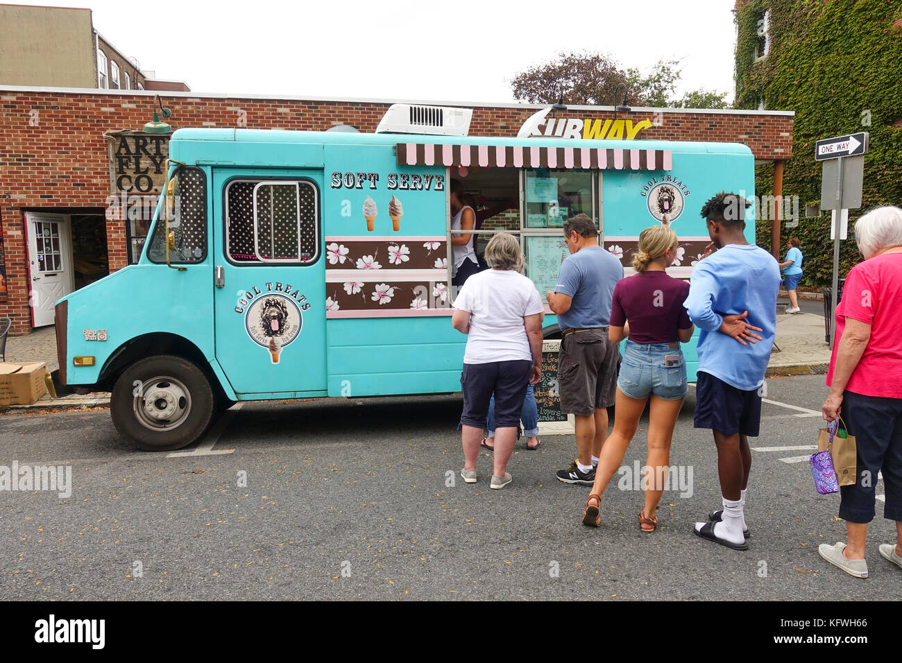 Soft serve Ice cream van, truck in the streets with line of people to order, Easton, Pennsylvania, United states. Stock Photo
