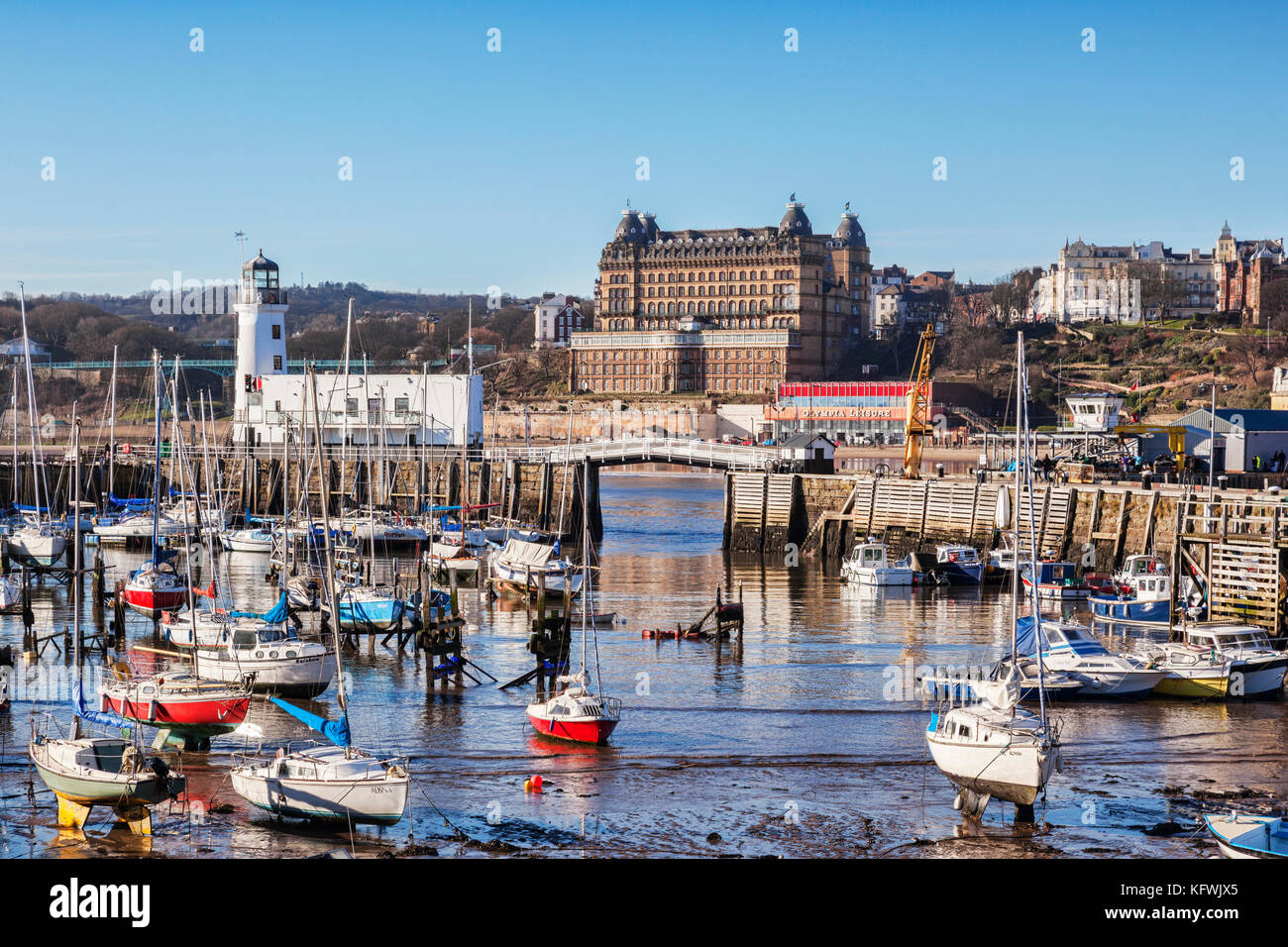 Scarborough Harbour, Lighthouse and Grand Hotel on a bright winter day. Stock Photo