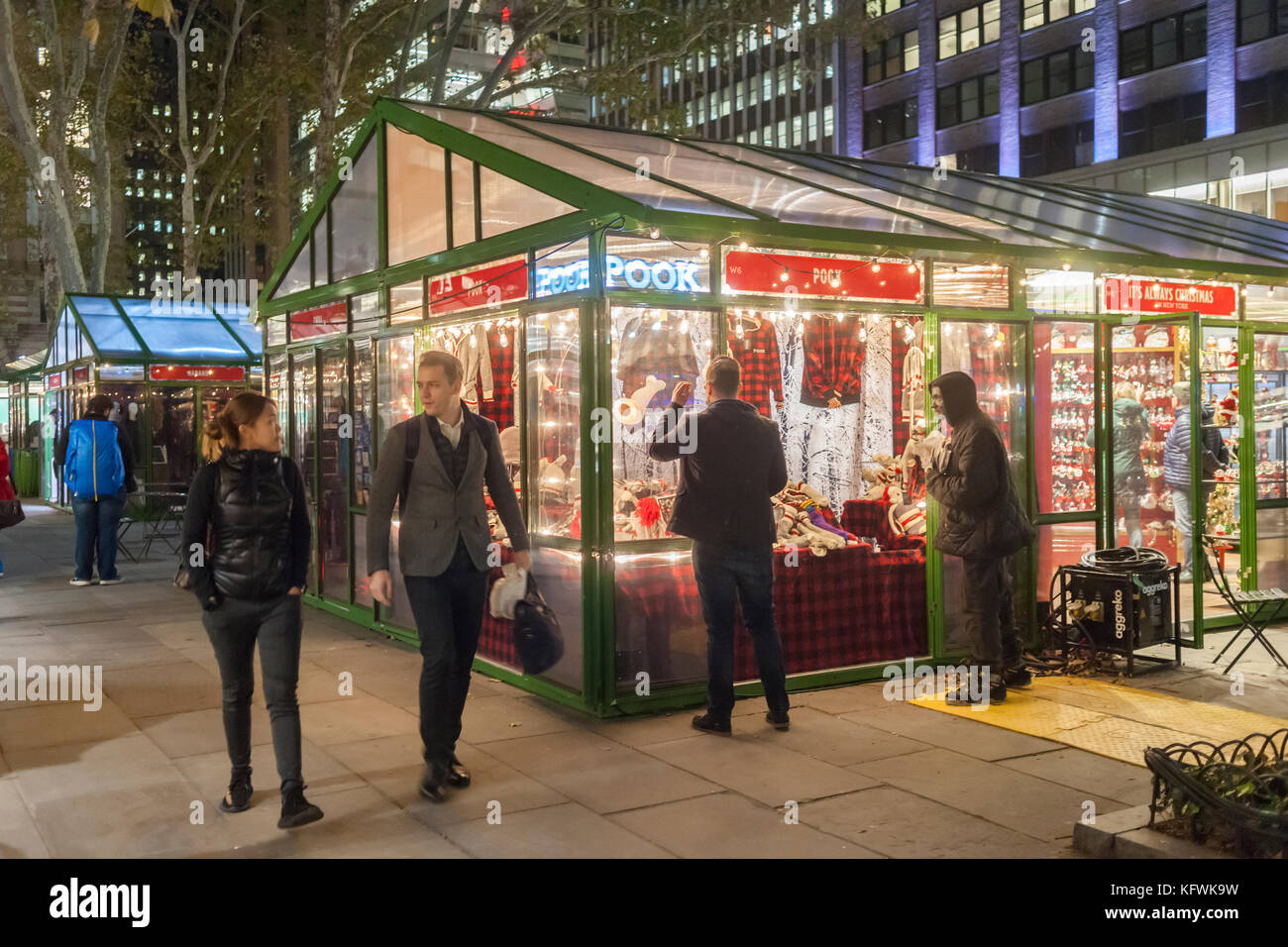 Shoppers browse the Bryant Park Holiday Market in New York on Tuesday