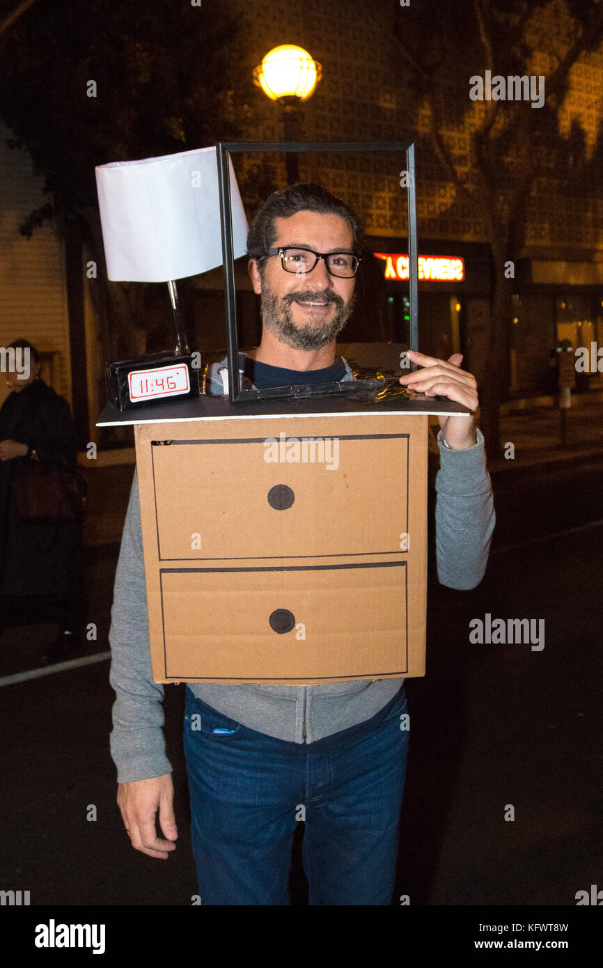 Los Angeles, California, USA. 31st October, 2017. A participant shows his  costume called "One Night Stand" at the West Hollywood (WeHo) Halloween  Carnival in West Hollywood, California on October 31, 2017. Credit: