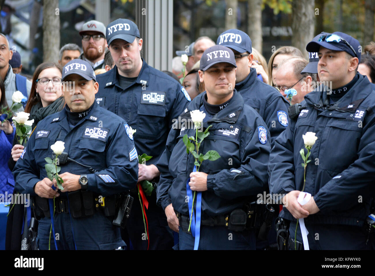 New York City, USA. 1st November, 2017. Police officers taking part in a moment of silence to honor those killed in the terrorist truck attack in Lower Manhattan. Credit: Christopher Penler/Alamy Live News Stock Photo
