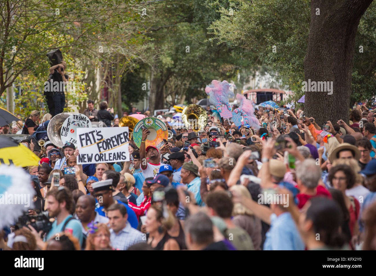 New Orleans, USA. 01st Nov, 2017. Crowds of people filled the street in the lower Ninth Ward for New Orleans style Second Line tribute to Antoine “Fats” Domino who recently passed away. Credit: Tom Pumphret/Alamy Live News Stock Photo