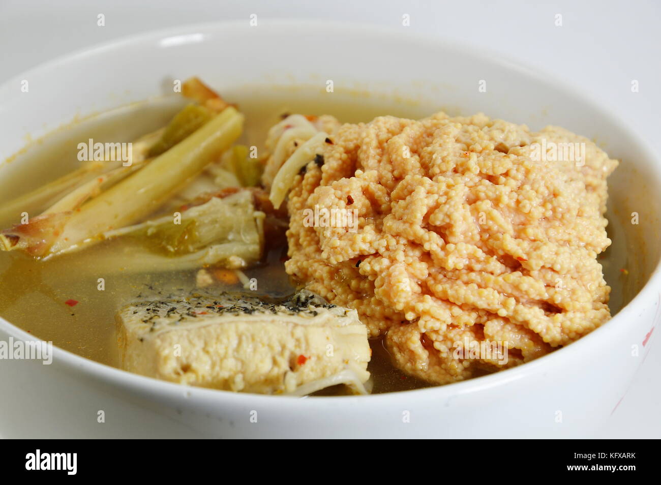 spicy fish eggs soup on bowl in white background Stock Photo Alamy