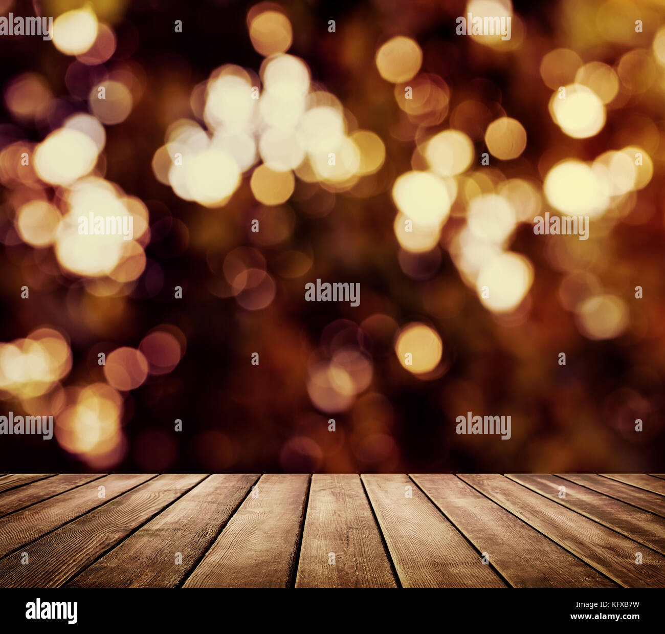 Christmas background with light spots and bokeh with empty table for your  montage Stock Photo - Alamy