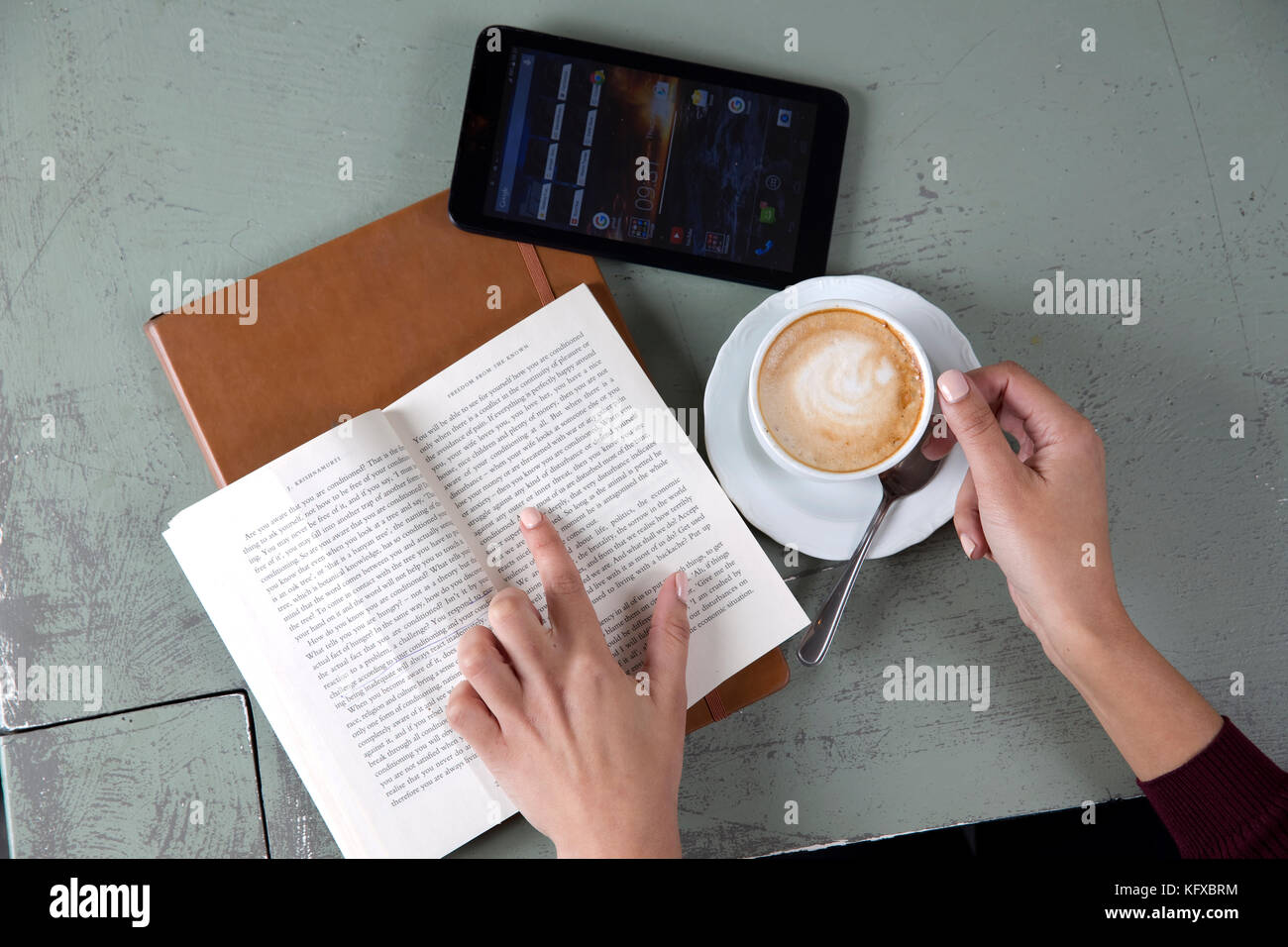 African woman reading a book hi-res stock photography and images - Alamy