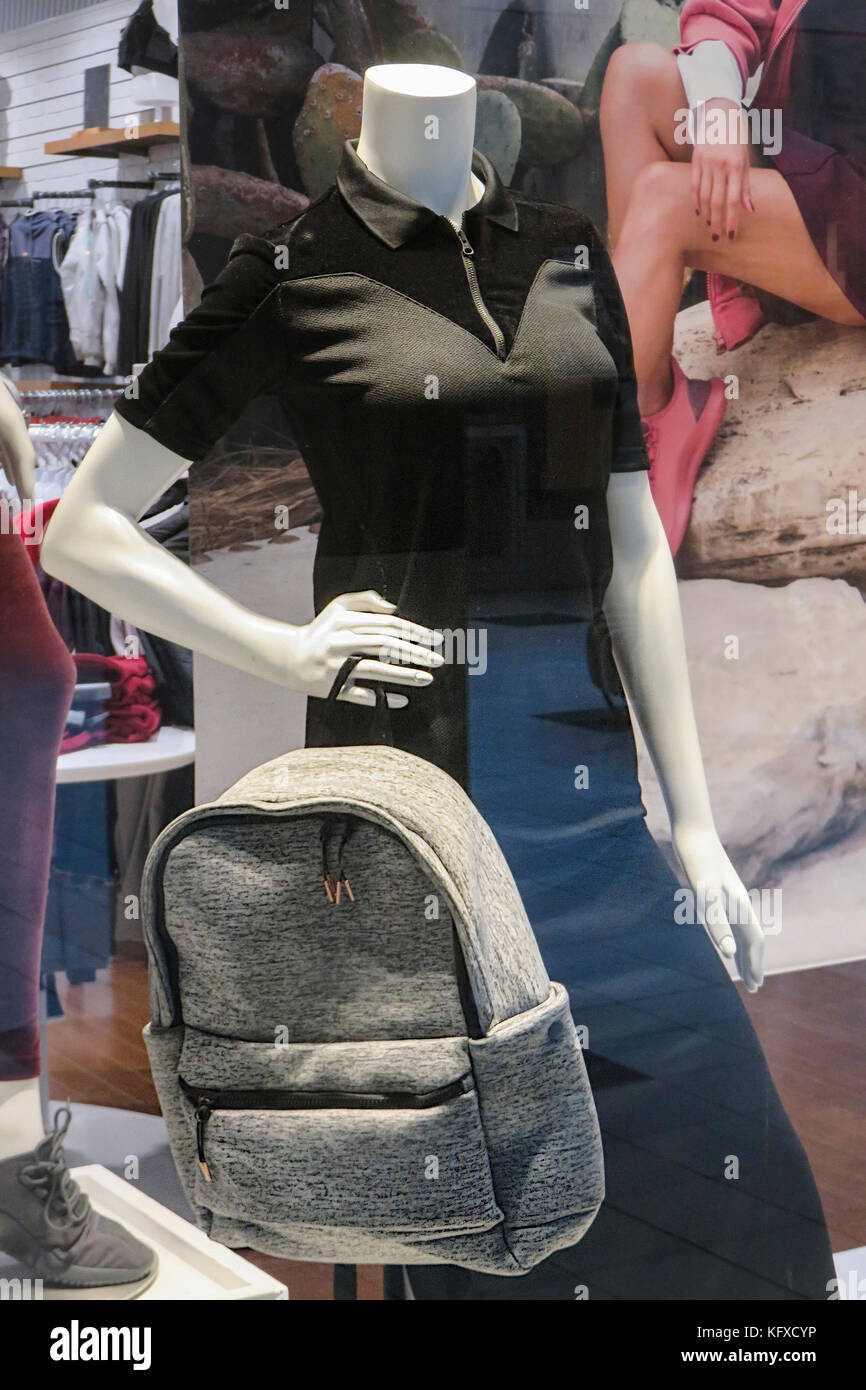 Fashionable Blouse and Shirt and Handbag on display Stock Photo