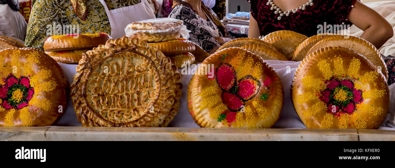 National uzbek bread sold in the market - Samarkand, Uzbekistan Stock Photo