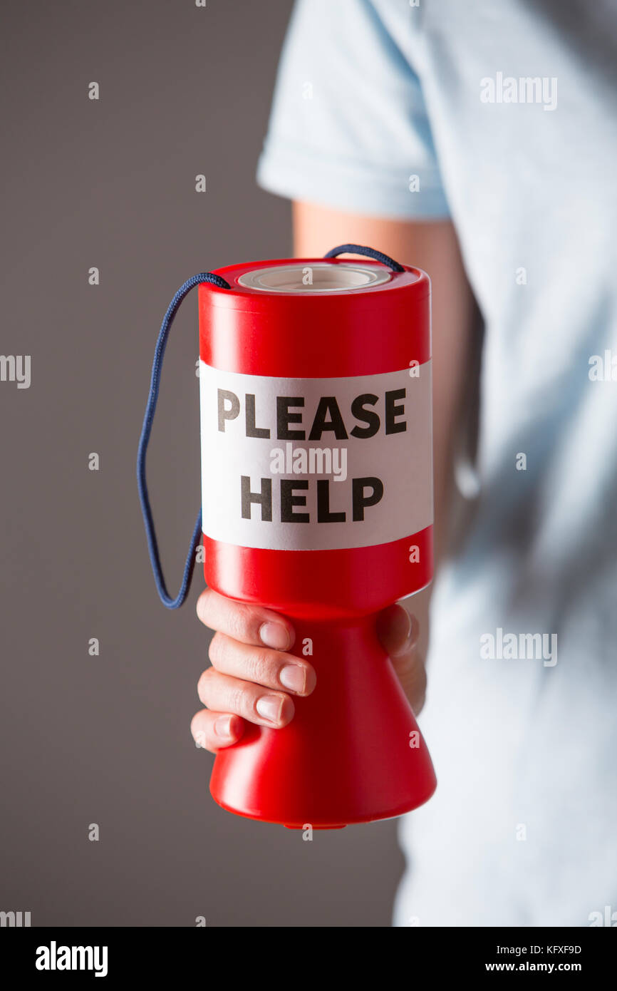 Studio Close Up Of Woman Holding Charity Collection Box Stock Photo