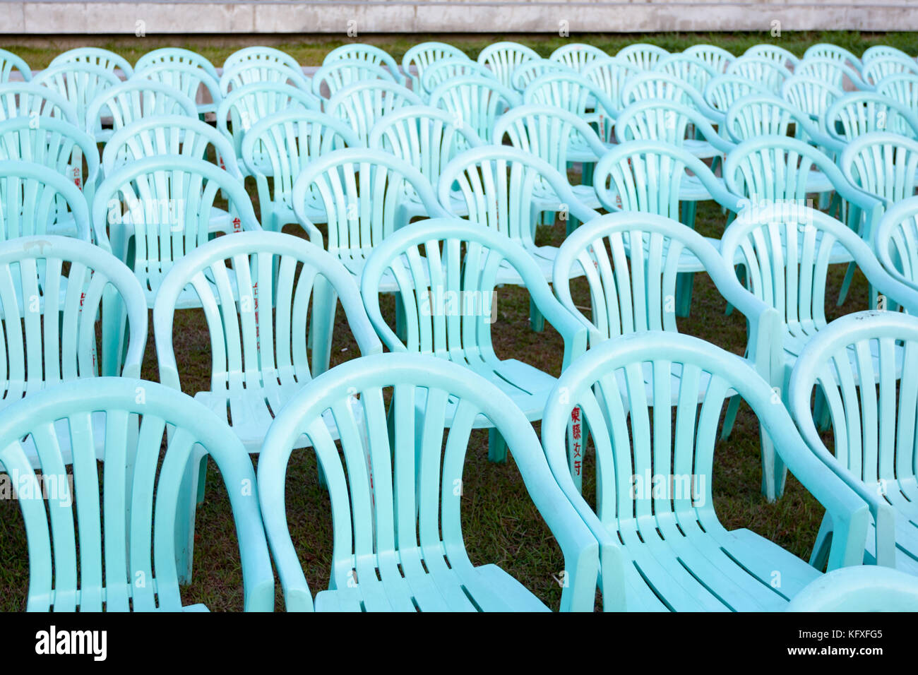 Many plastic chairs, outdoor event Stock Photo Alamy