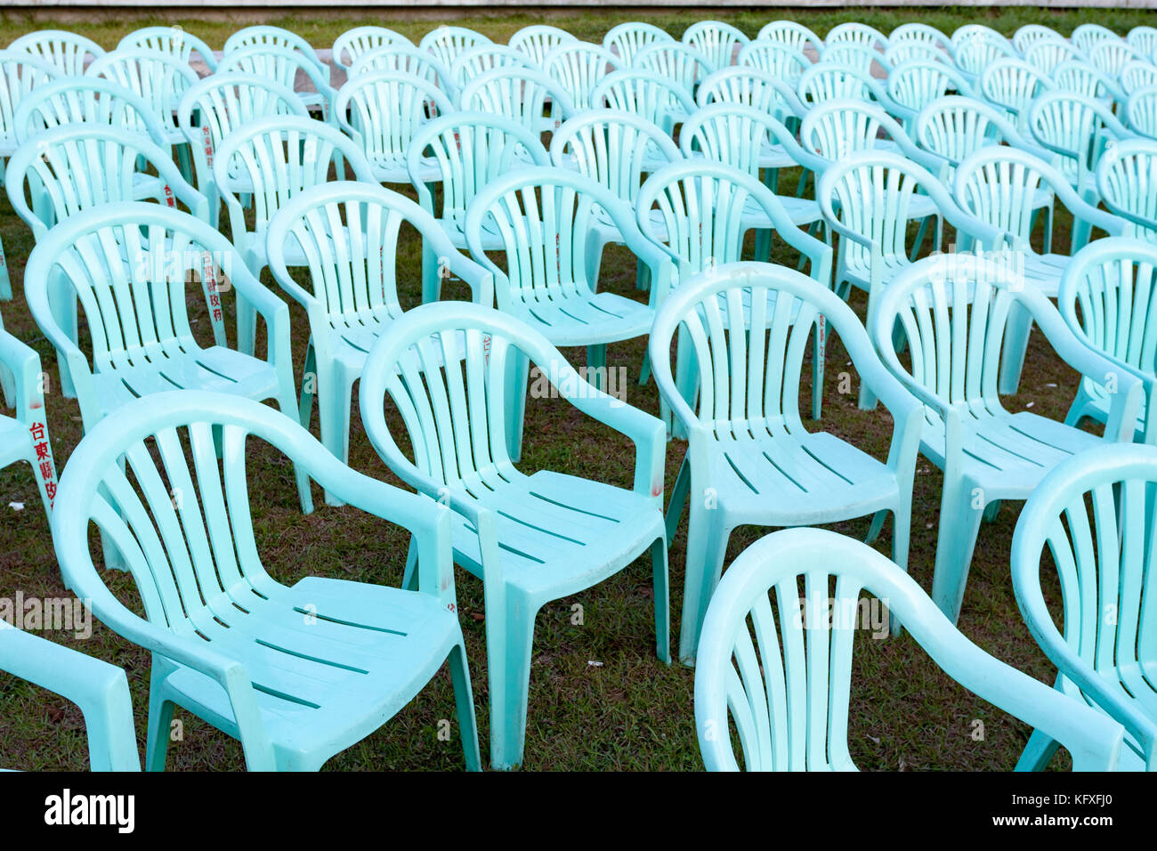 Many plastic chairs, outdoor event Stock Photo Alamy