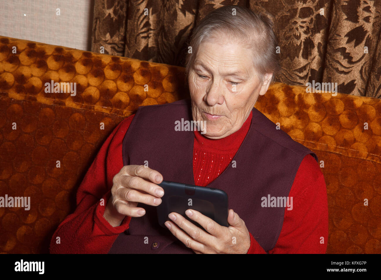 senior women read e-book Stock Photo