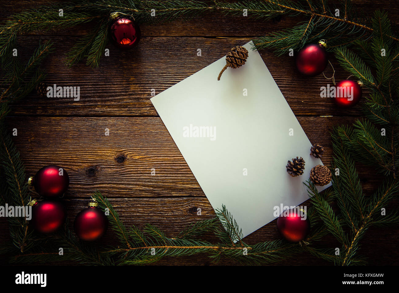Child letter to Santa Claus. Christmas decorations on wooden background