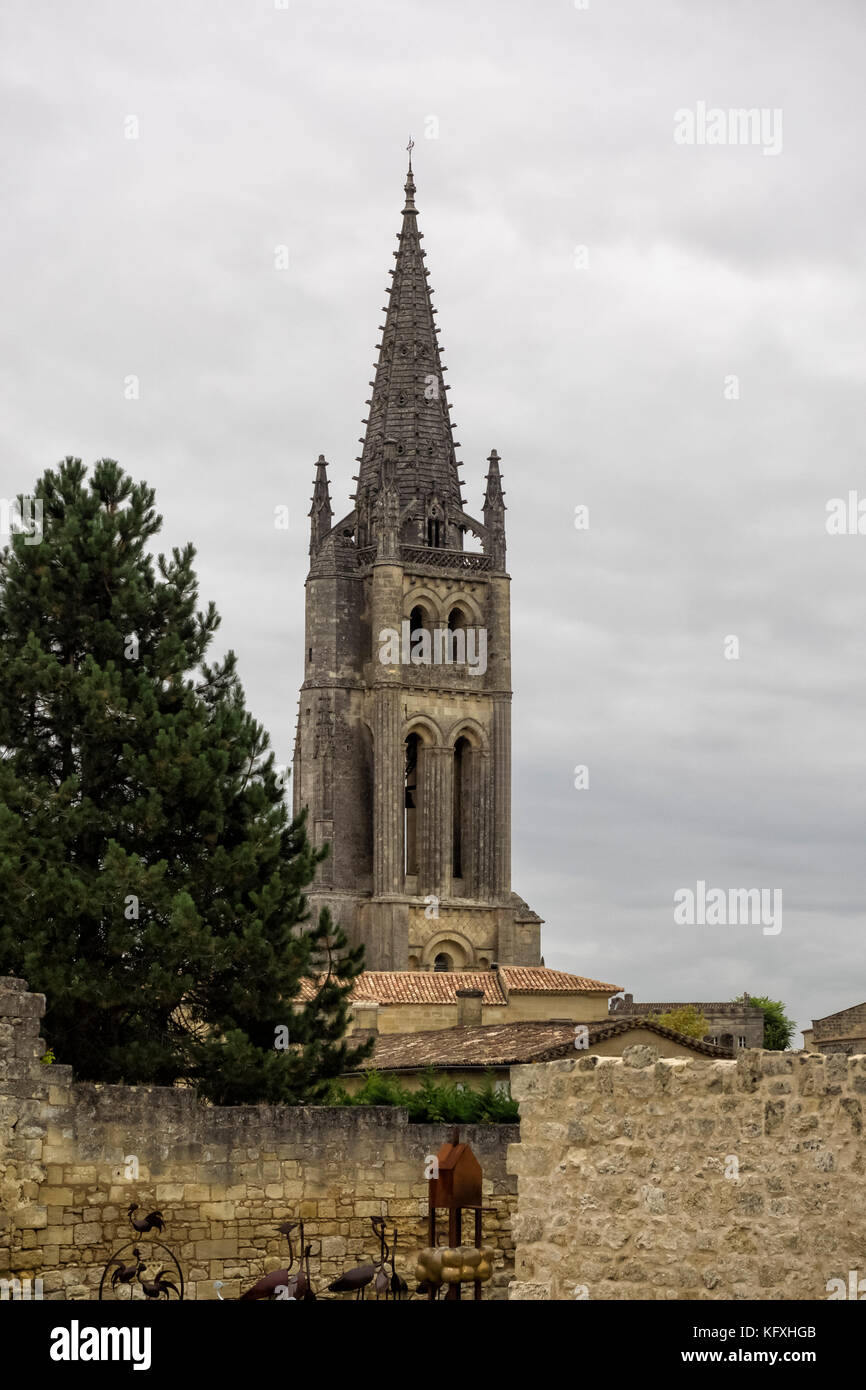 SAINT-EMILION, FRANCE - SEPTEMBER 07, 2017:  The Bell Tower of the Monolithic Church seen above the Town Walls Stock Photo