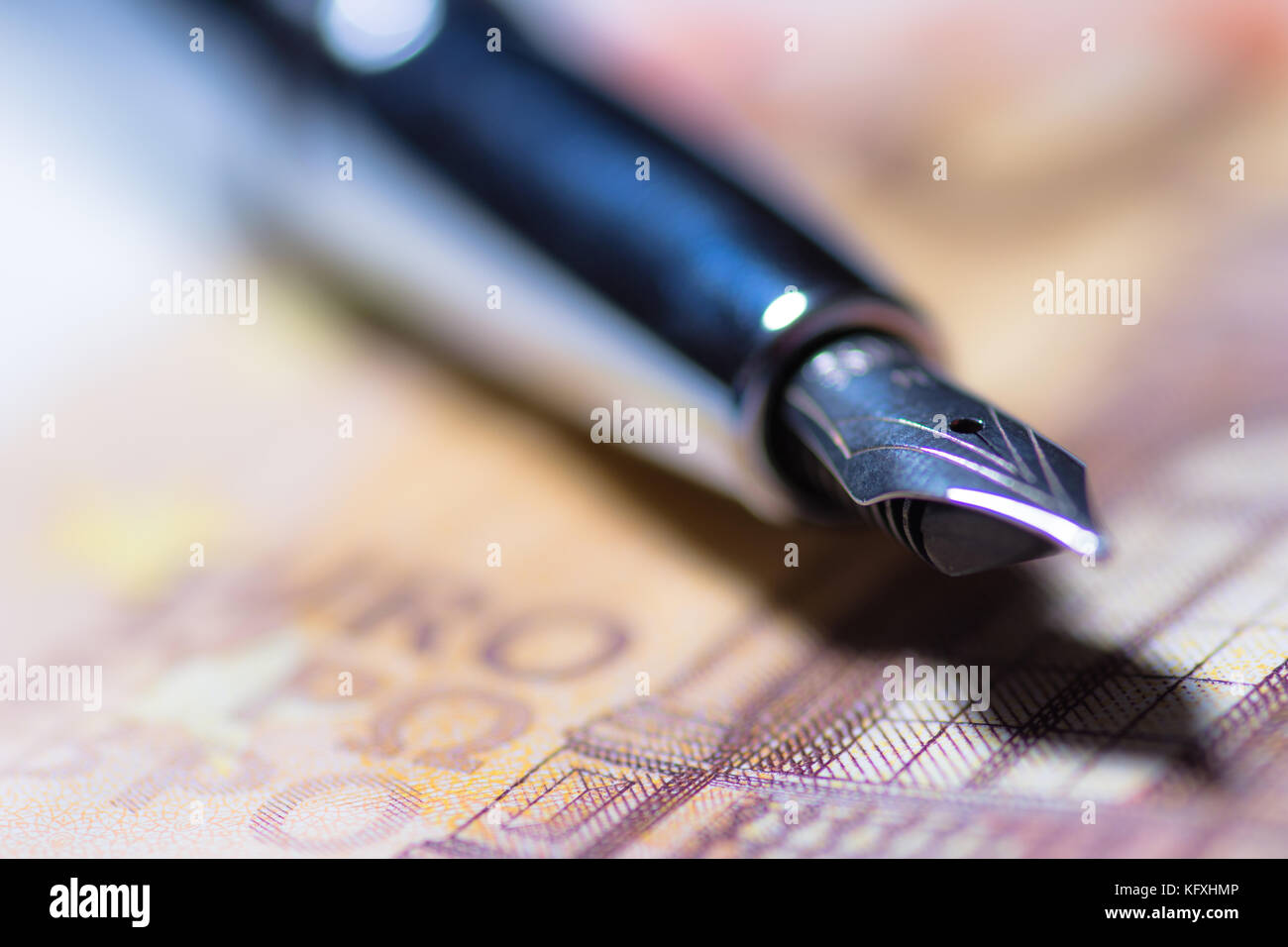 Journalists bribery concept with pen and banknote. Stock Photo