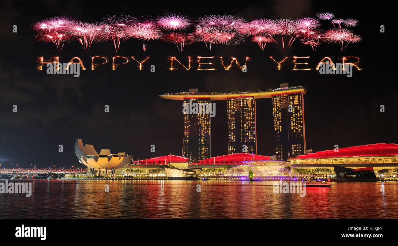 Happy new year firework Sparkle with marina bay at night, urban landscape of Singapore Stock Photo