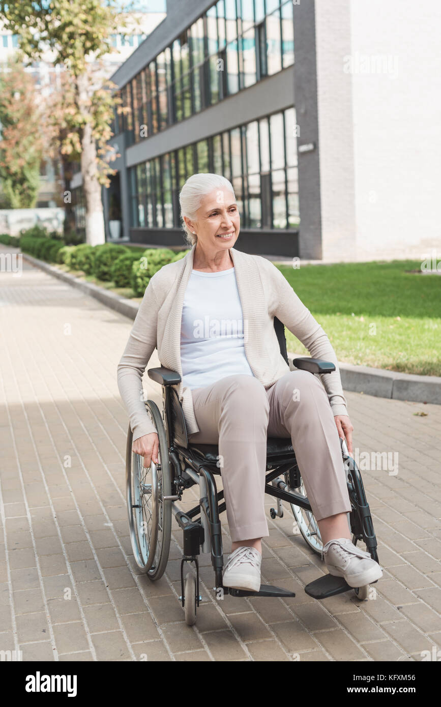 Happy wheelchair people old hi-res stock photography and images - Alamy