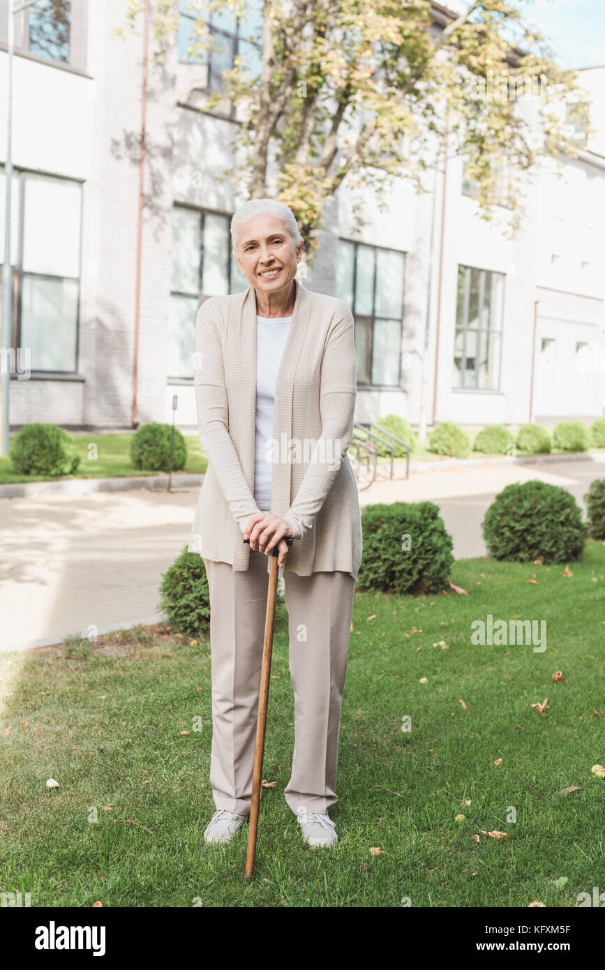 senior woman with cane Stock Photo