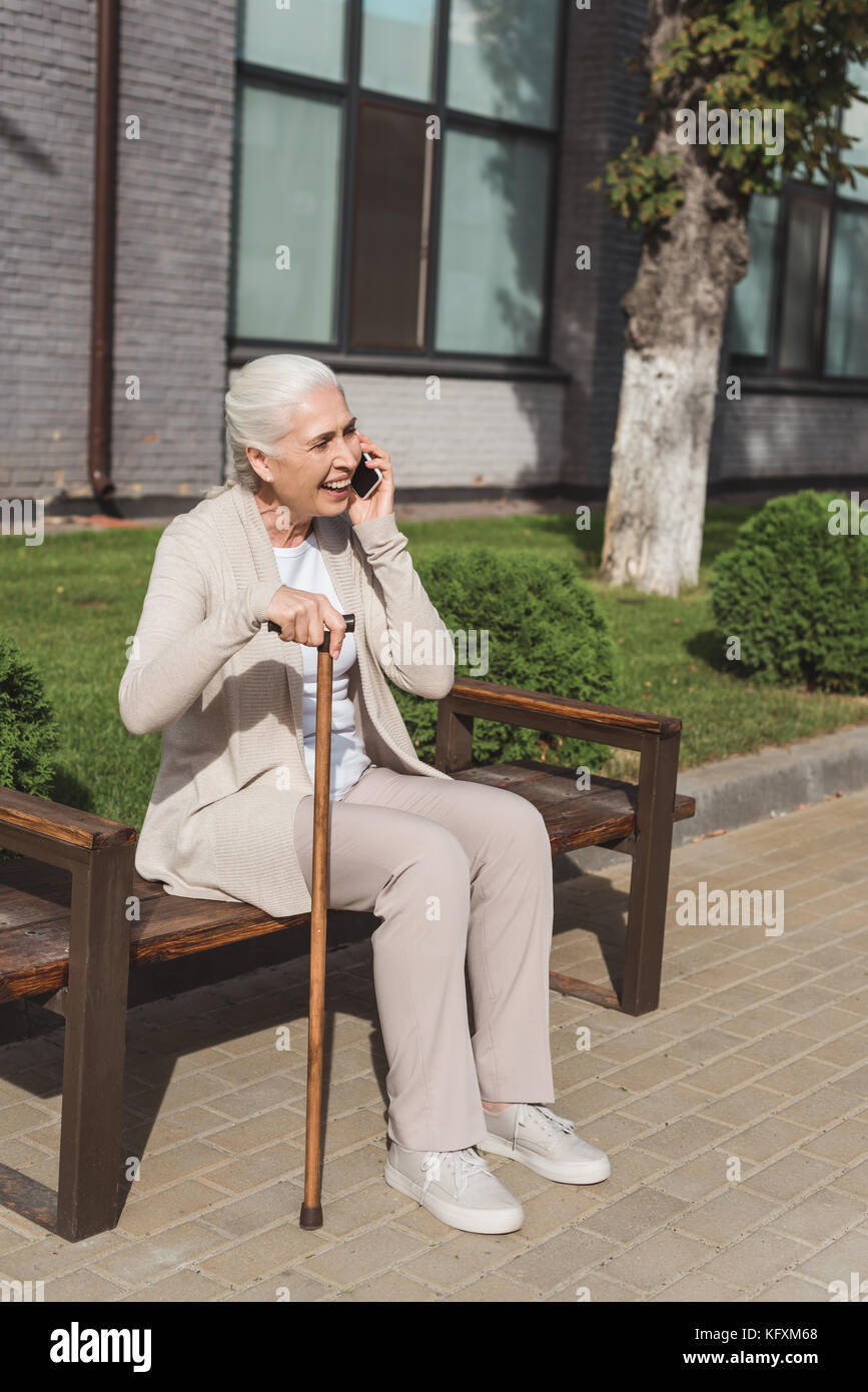 senior woman talking on smartphone Stock Photo - Alamy