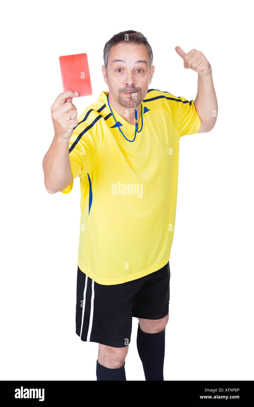 Soccer Referee Showing Red Card On White Background Stock Photo