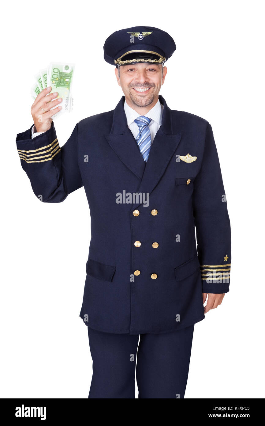 Portrait Of Happy Pilot Holding Euros On White Background Stock Photo