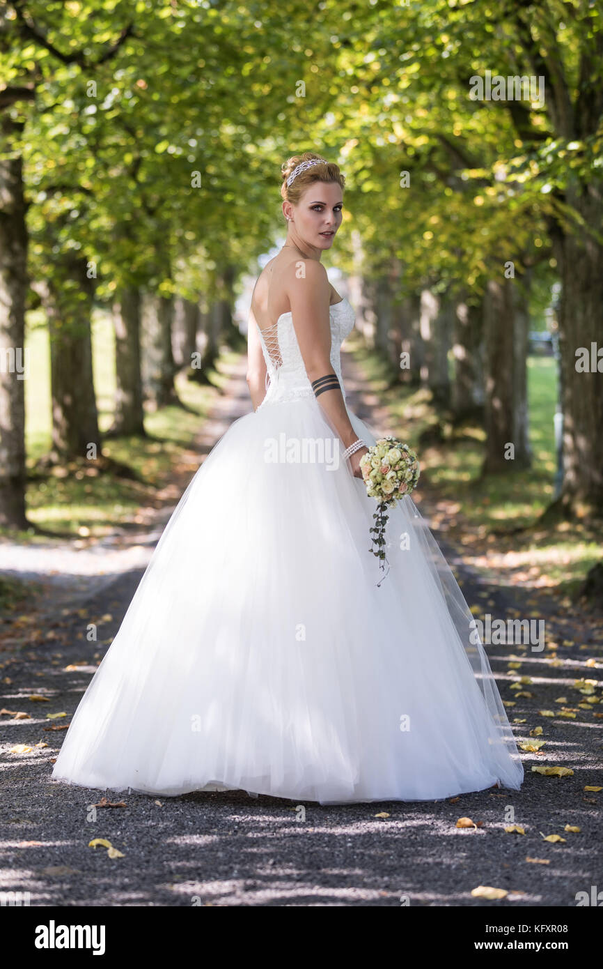 Blonde white dress woman hi-res stock photography and images - Alamy