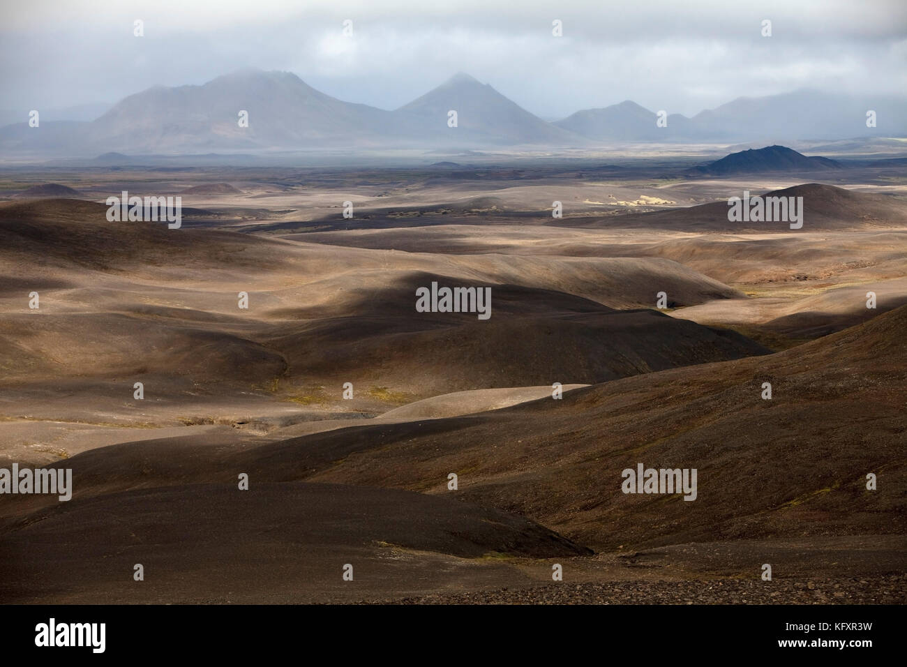 Desert-like, mountainous landscape with light and shadow, Moedrudalsfjalsfjallgardur, highlands, Island Stock Photo