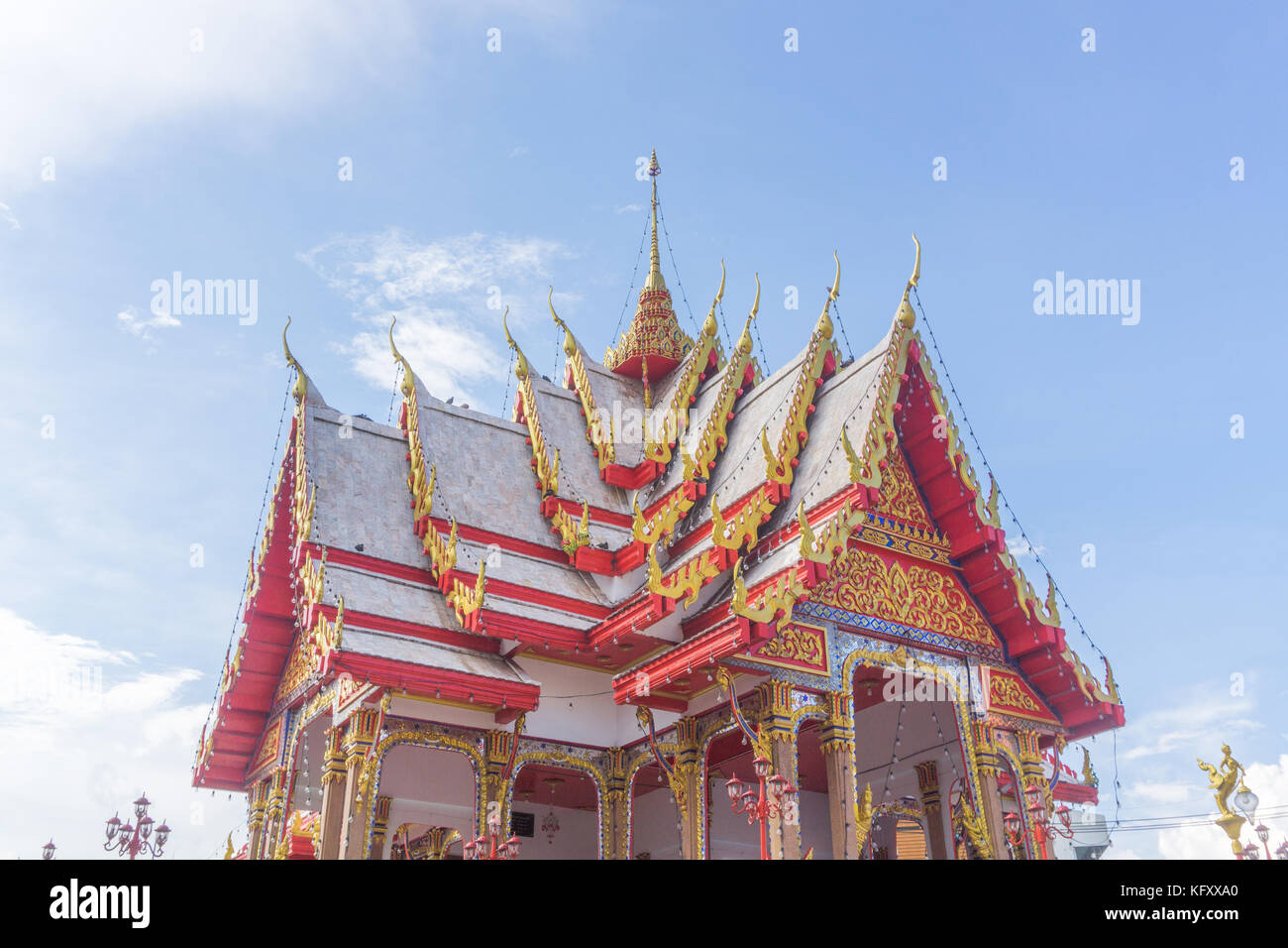 Thai temple and blue sky Stock Photo - Alamy