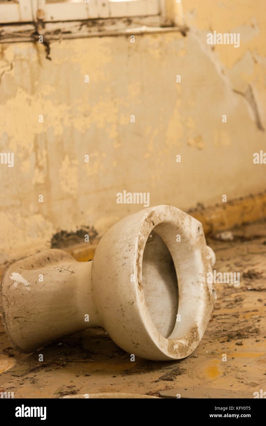 Broken toilet in abandoned sanatorium - hospital room Stock Photo