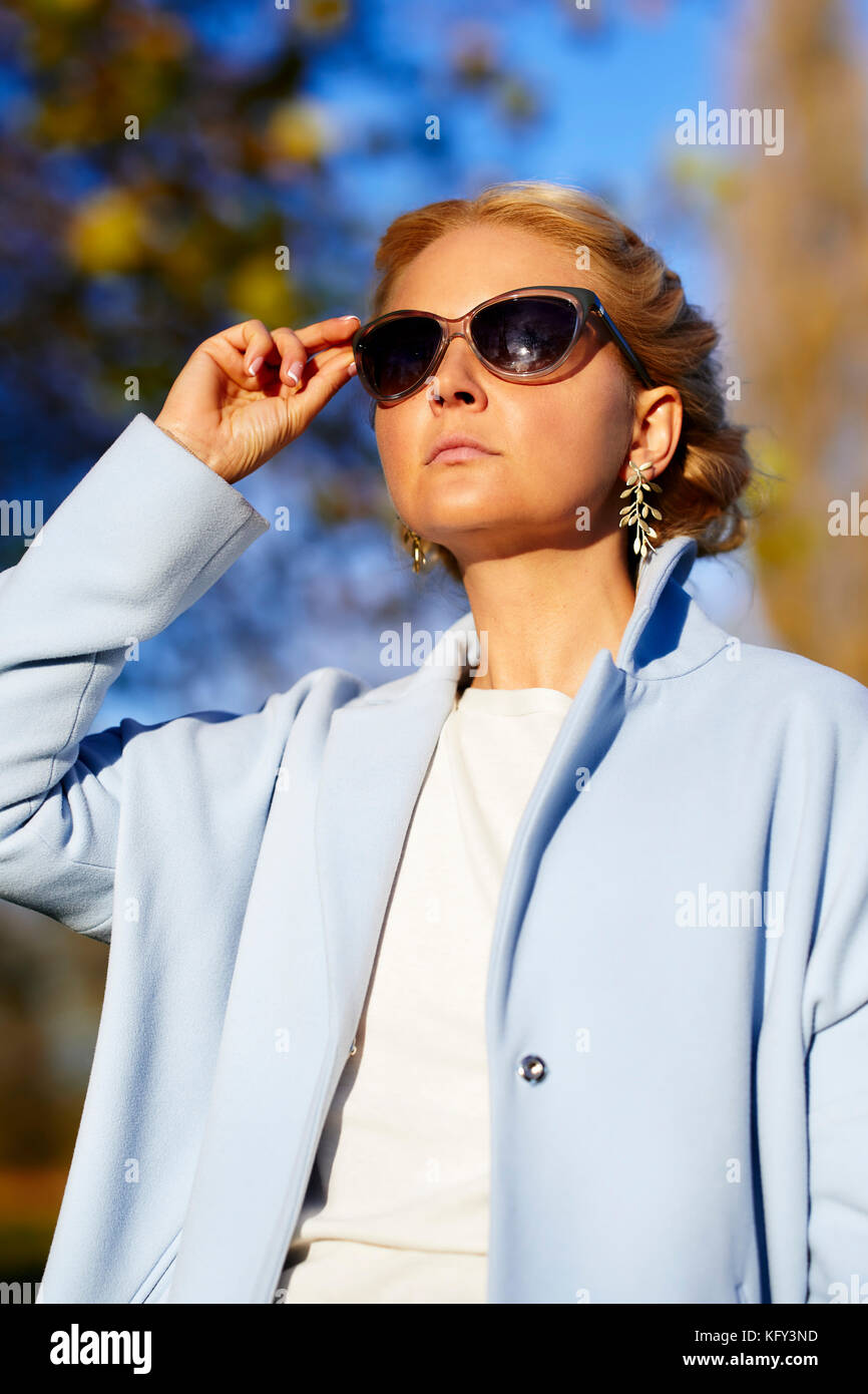 Beautiful woman wearing sunglasses Stock Photo