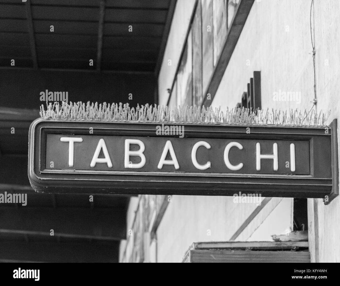 A sign saying 'tabacchi' which means Tobacco selling point in Italian Stock Photo