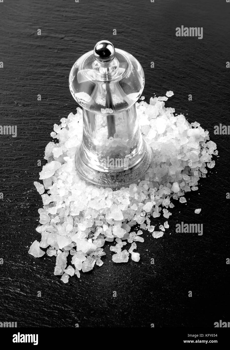white salt on black background with copy space Stock Photo