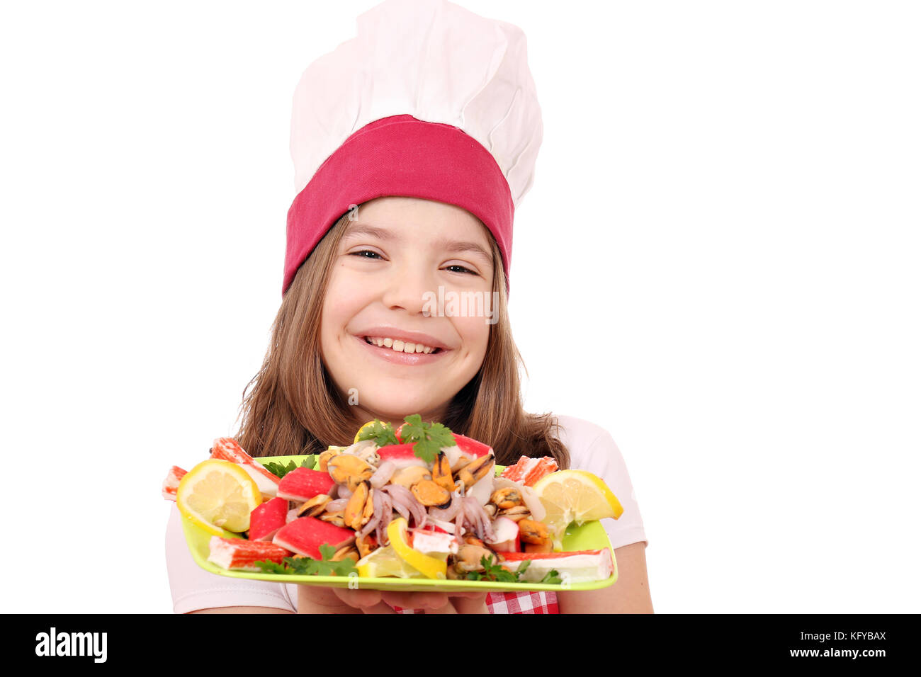 beautiful little girl cook with seafood Stock Photo