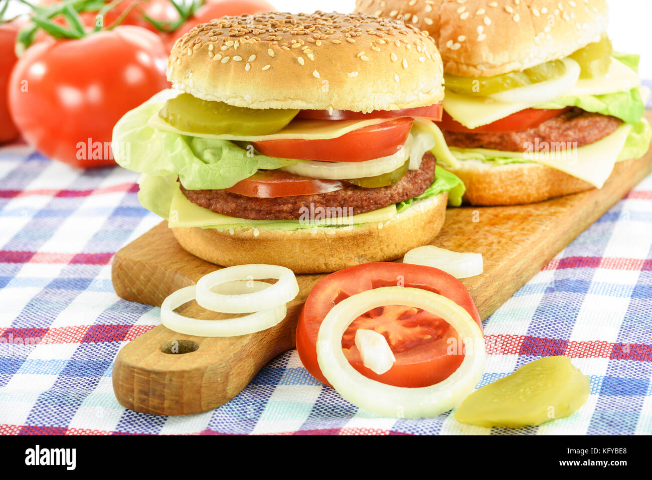 Concept image of traditional homemade hamburgers with beef, lettuce