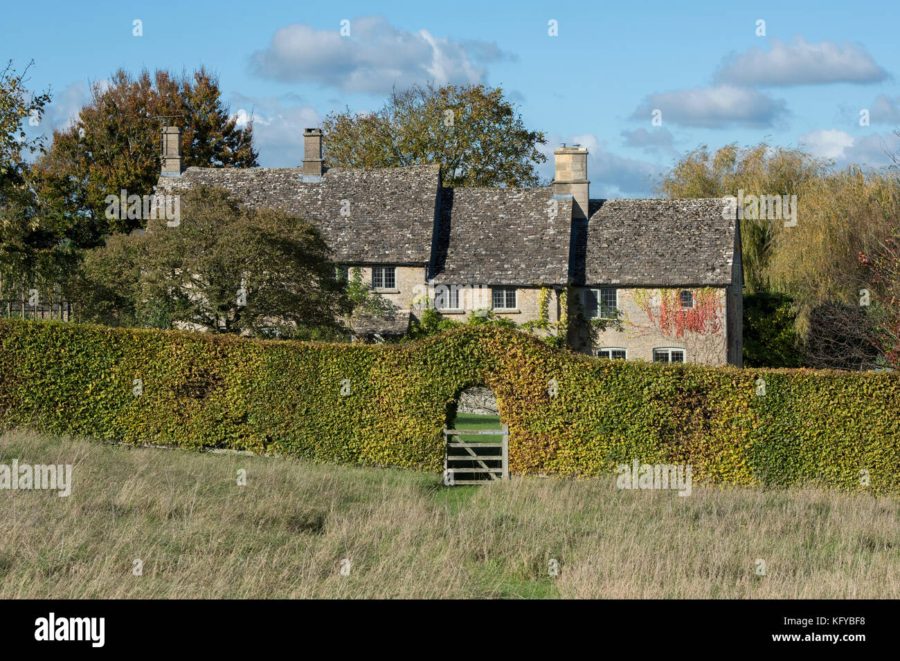 Stone house in autumn. Chilson, Evenlode Valley, Oxfordshire, England Stock Photo