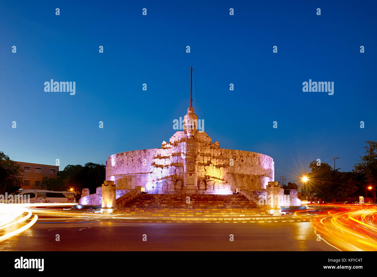 Night shot of the Monument to Motherland, Monumento a La Patria in spanish, with car light trails, in Merida, Yucatan, Mexico Stock Photo